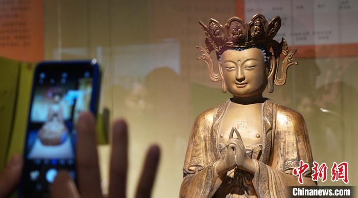 图为敦煌研究院举办的佛教艺术展。(资料图) 魏建军 摄
